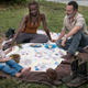 Other “Family Fun Day” images include Rick reading Judith The Wizard of Oz and Judith and Michonne sword-fighting with sticks. Not kidding.